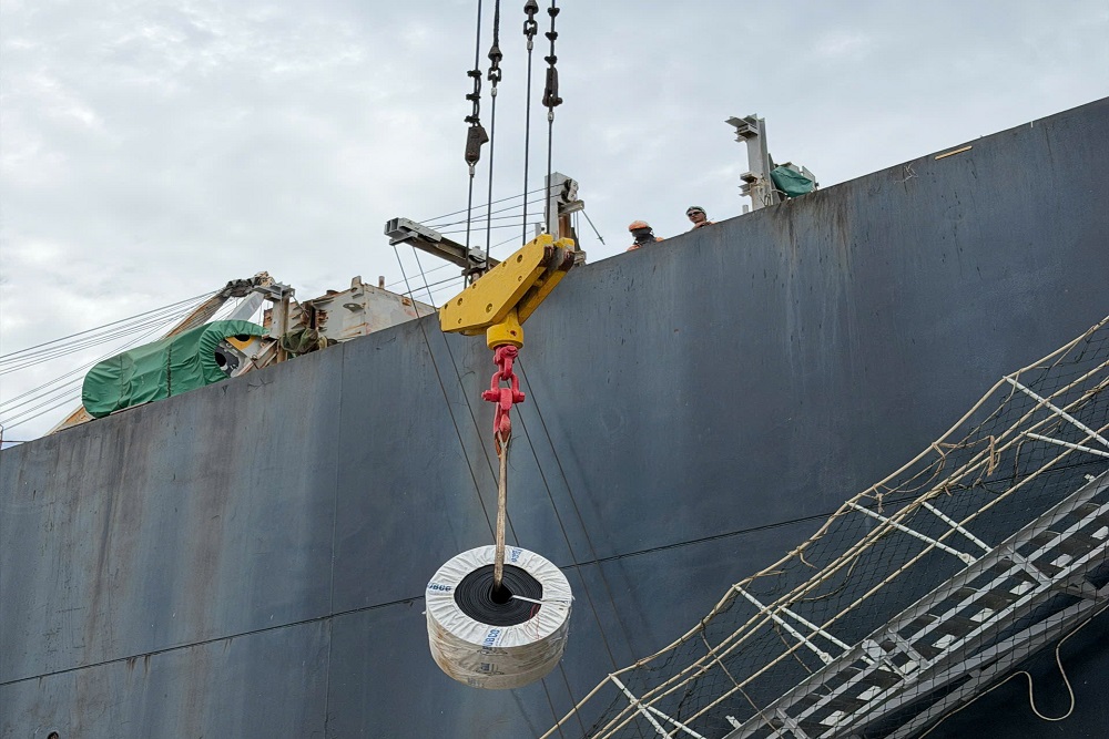 Spare parts and equipment delivered alongside a bulk carrier at Nghi Son