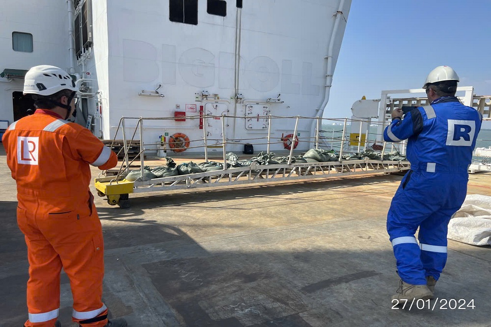 Class surveyor witnessing an accommodation ladder load test during VNS marine service
