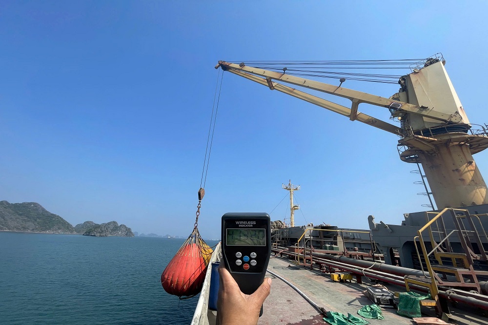 Crane load testing using a calibrated load indicator